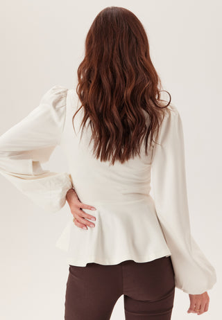 Long Sleeve Peplum Top