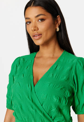 Triniti ss wrap blouse