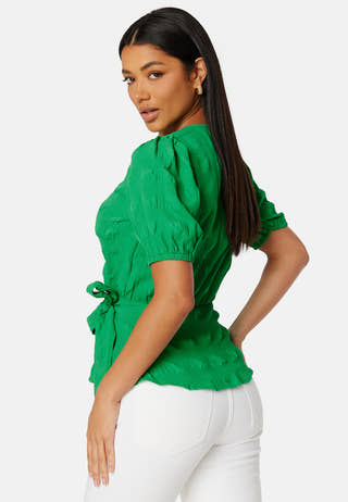 Triniti ss wrap blouse