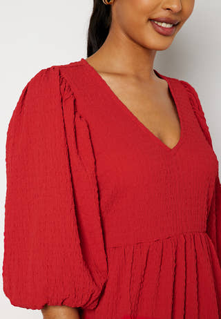 Fredrika v-neck flounce dress