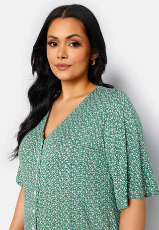 Malini button frill dress
