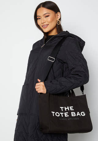 the-marc-jacobs-small-traveler-tote-001-black_3