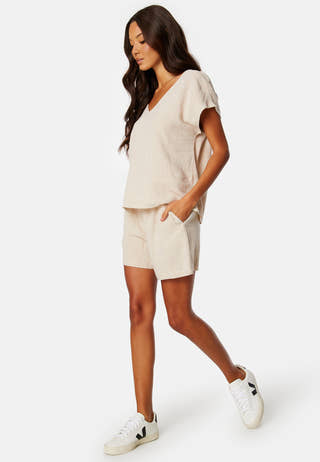 Filia V-Neck Capsleeve Top